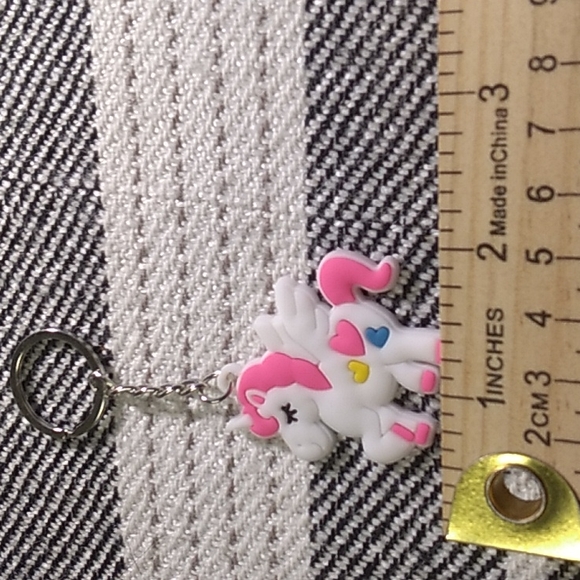 8 Unicorn Keychain's cute for any occasion. White, pink, purple, yellow - Picture 7 of 15
